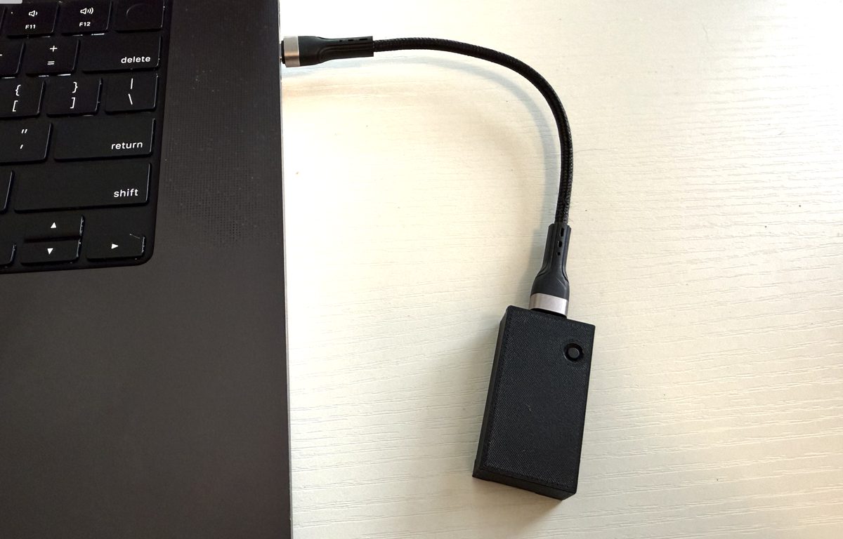 Keyboard Jiggler plugged into a laptop USB port
